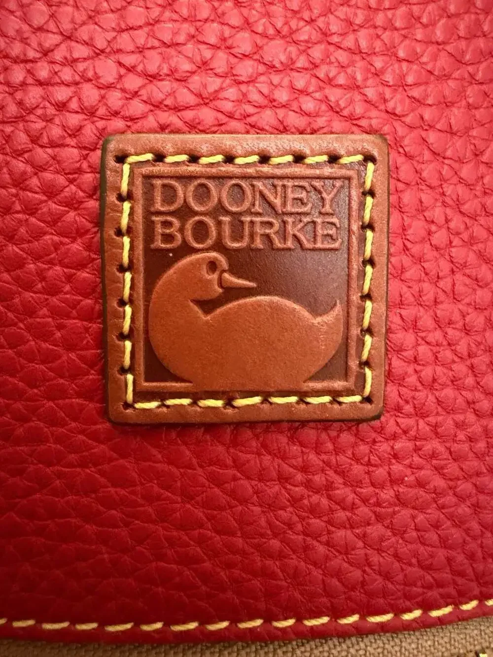 Dooney & Bourke Pebble Grain Domed Satchel in Red